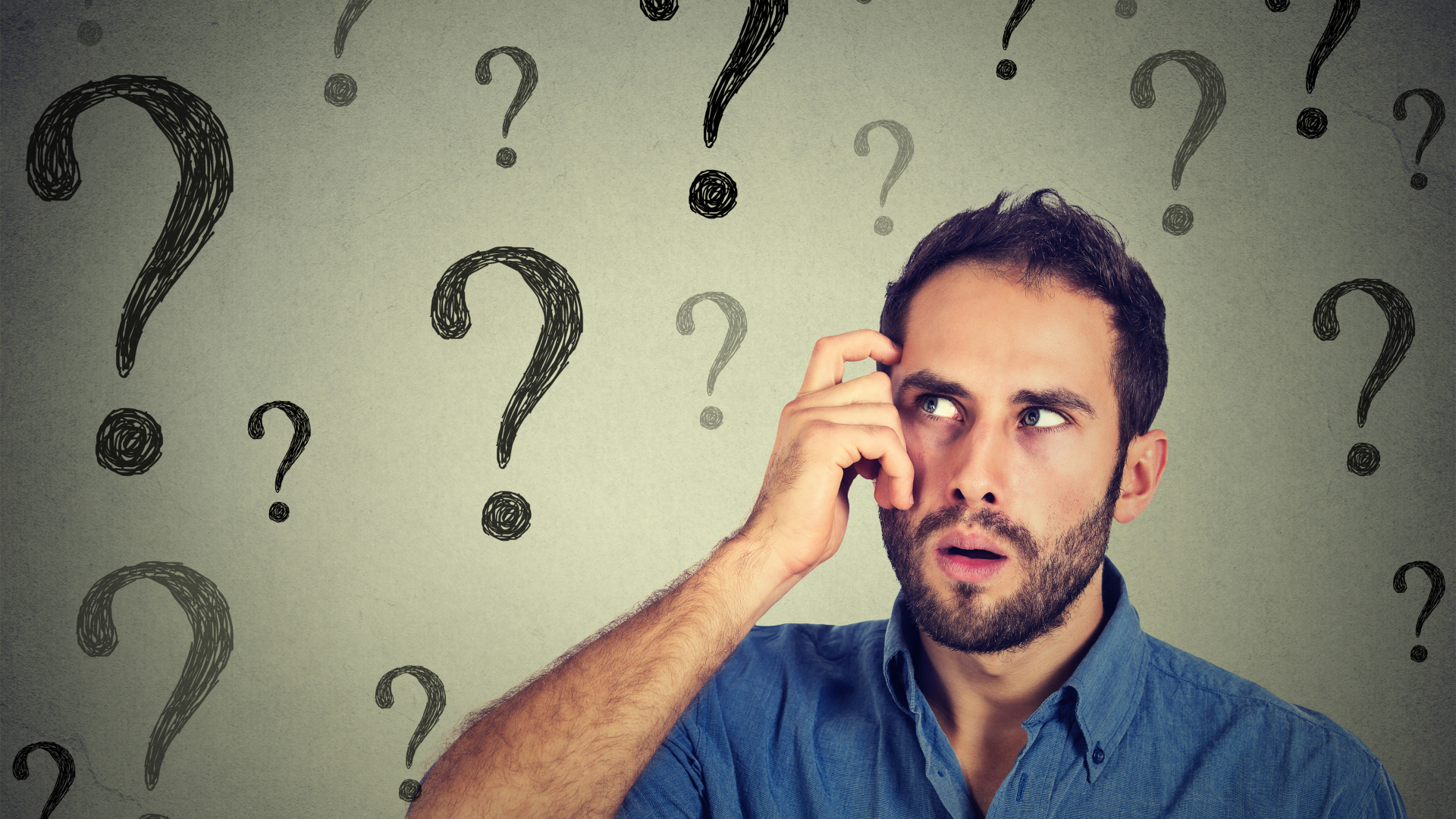 Confused man with questions 1920 x 1400